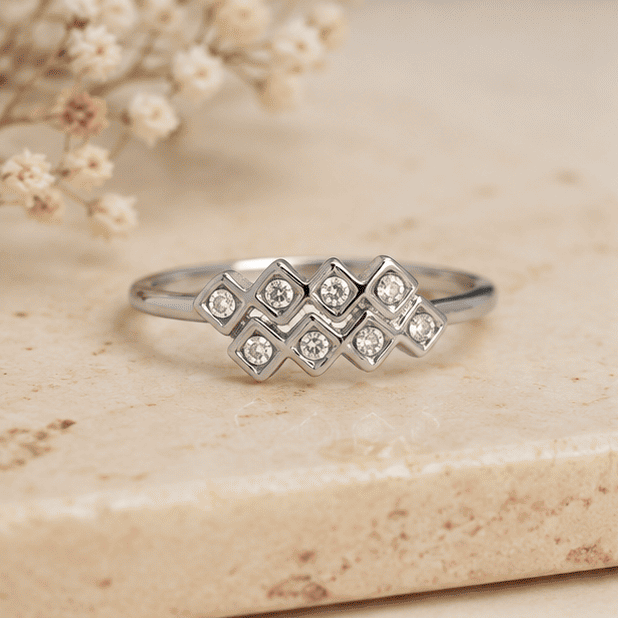 925 Sterling Silver Geometric CZ Ring for Women on Beige Stone Surface | Vrindae Argente