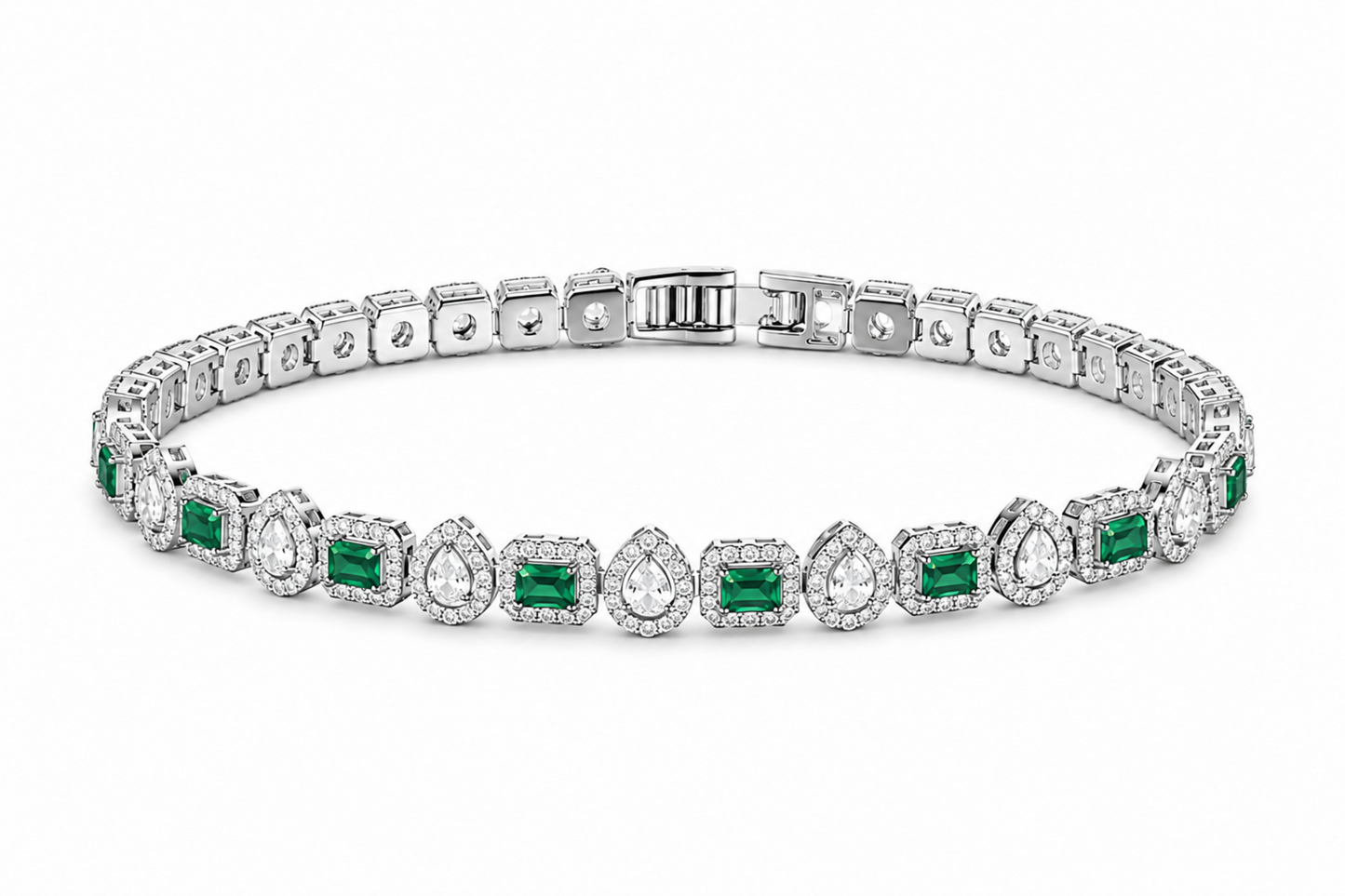 Diamond bracelet with emerald stones on a white background