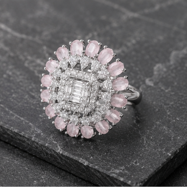 Elegant 925 sterling silver adjustable pink gemstone statement ring styled in a luxury grey and silver setting.