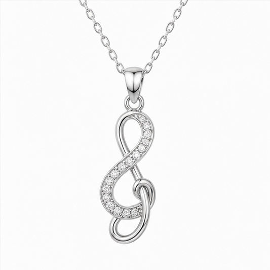 Silver necklace with a unique pendant displayed in various settings.