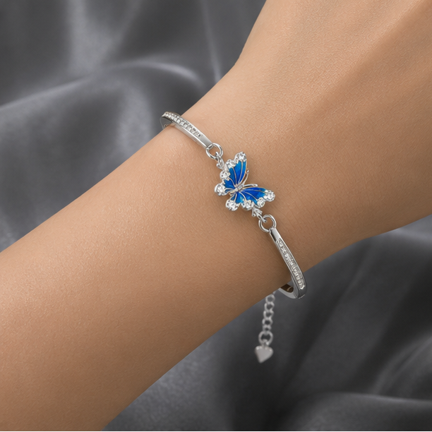 Vrindae Argente Azure Flutter butterfly kada bracelet worn on the wrist, showcasing its elegant and minimal luxury design.