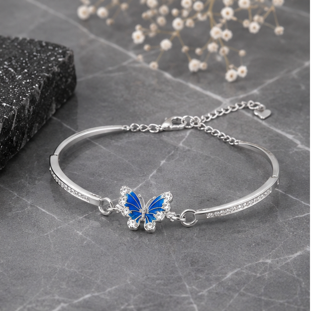 Vrindae Argente Azure Flutter butterfly kada bracelet worn on the wrist, showcasing its elegant and minimal luxury design.