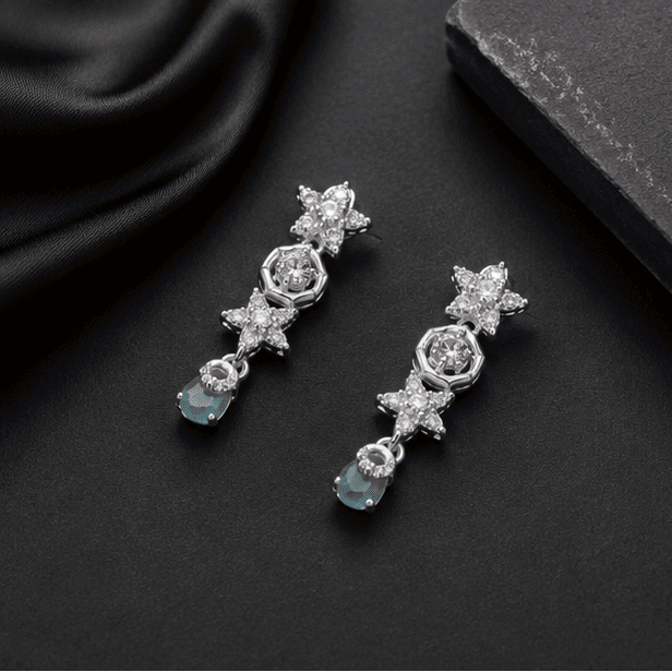 Celestial Aqua Drop 925 sterling silver dangle earrings showcasing sparkling stones and elegant craftsmanship.