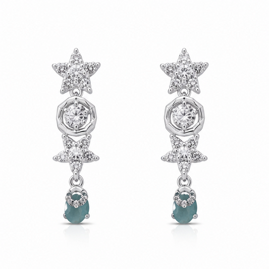 Celestial Aqua Drop 925 sterling silver dangle earrings with star motifs, cubic zirconia detailing, and aqua blue teardrop stones on a white background.